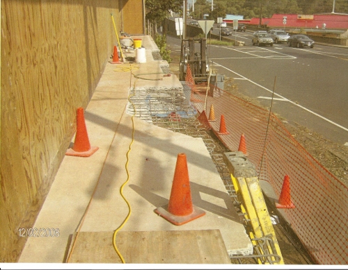 Repair of concrete at Maui Community Clinic.